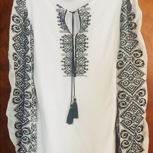 White top with black embroidery